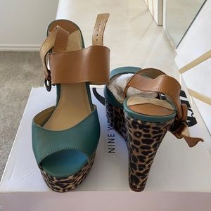 Never worn sandal wedge.